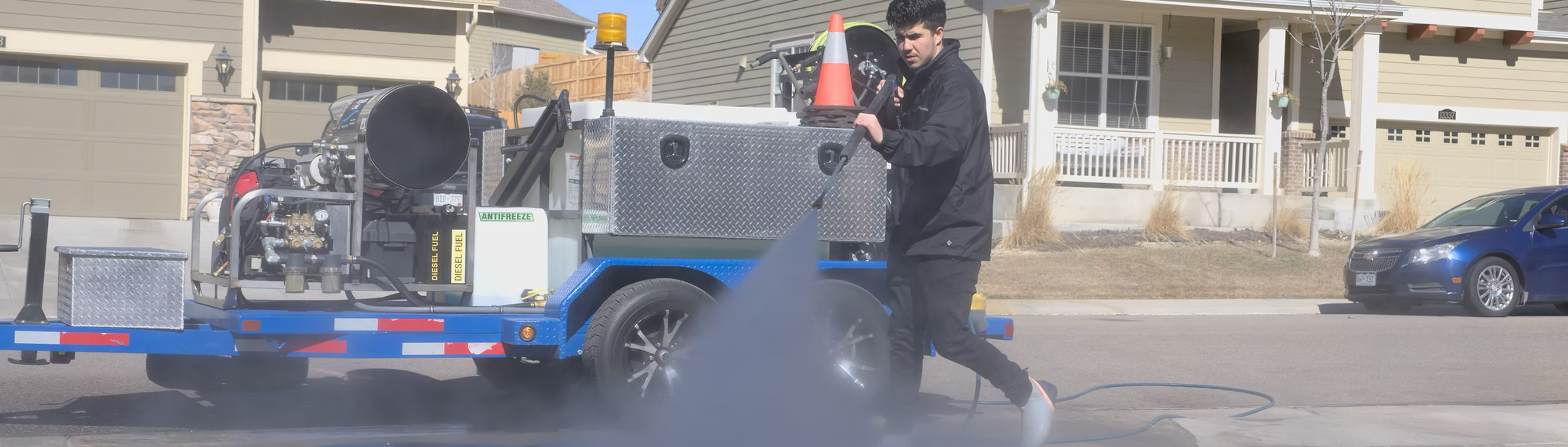 Professional driveway pressure washing service in Denver, Colorado